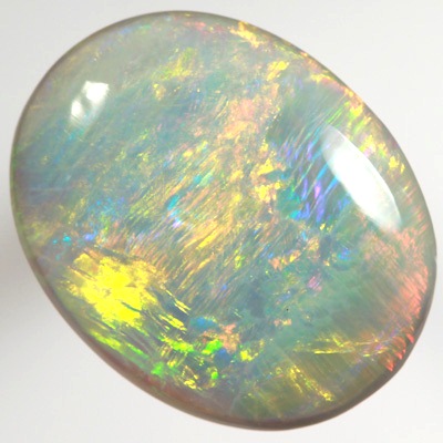 SOLID SEMI BLACK OPAL Bright orange, green and yellow over blue. SEE VIDEO